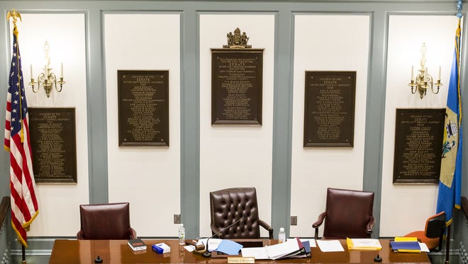 The Senate President's chair sits empty during a recent legislative session. The Lieutenant Governor serves in this role, but that position is currently vacant.