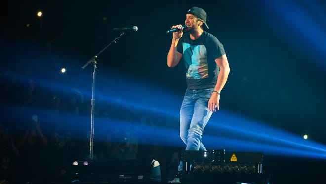 Country music star Luke Bryan performs before a sold out crowd at the Pan American Center March 8, 2016.