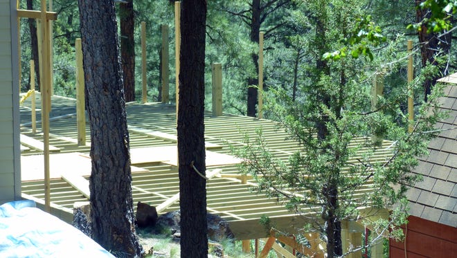 Adding decks to houses is big business in Ruidoso.