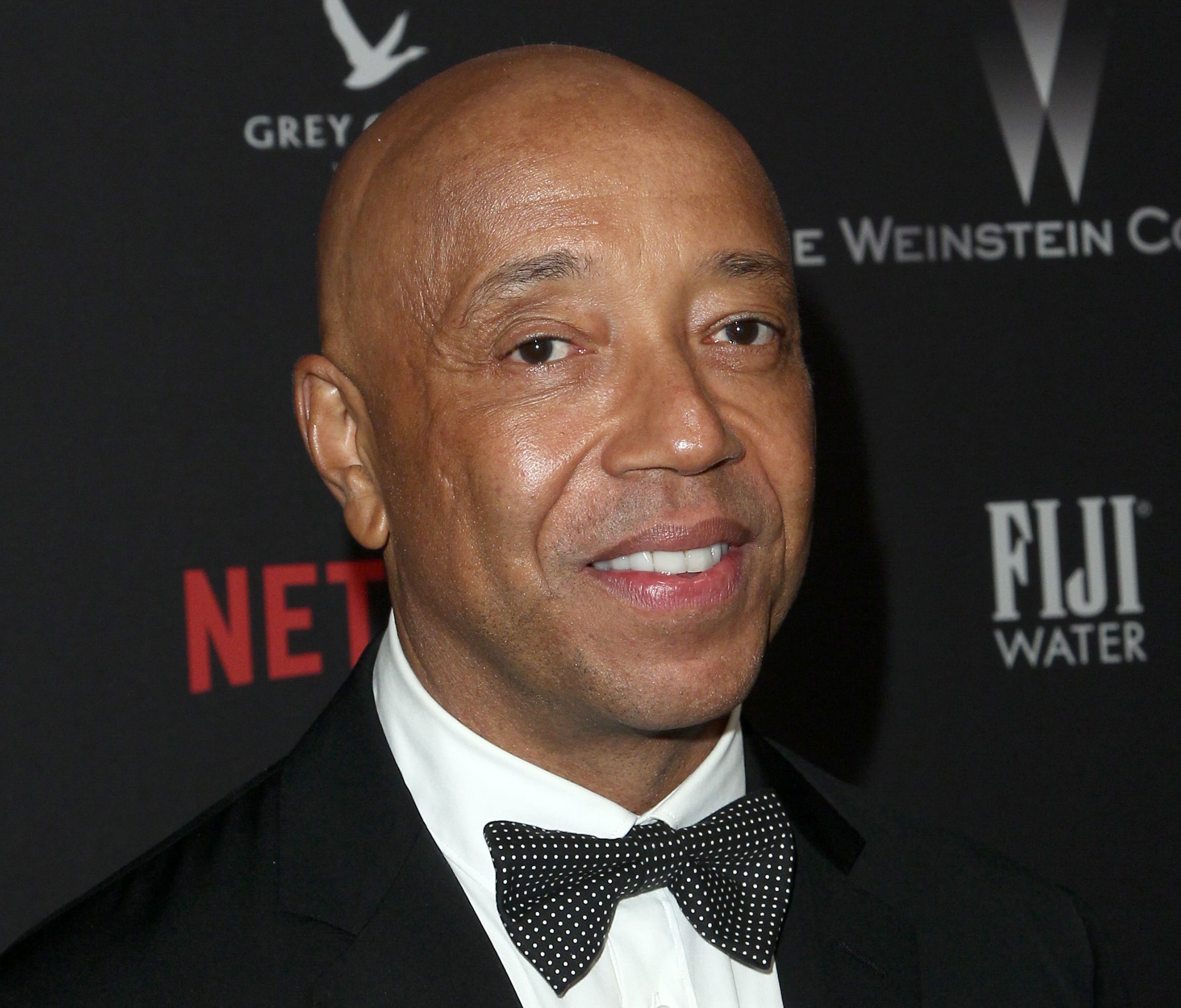 Russell Simmons was hit with a $5 million lawsuit Wednesday from a woman alleging he raped her in 2016.
