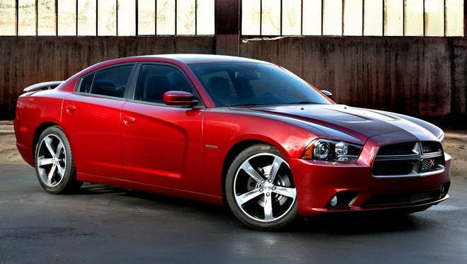 Chrysler says eight-speed automatics, which it pioneered outside the luxury-car realm, save owners billions of dollars in fuel costs, overall. A 2014 Dodge Charger with eight-speed is shown.