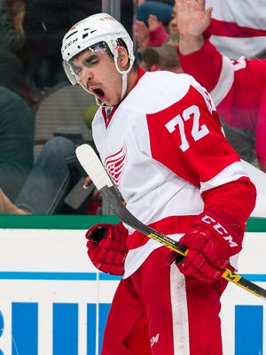 Red Wings center Andreas Athanasiou (72) celebrates scoring his second goal of the game against the Dallas Stars during the third period in Dallas.