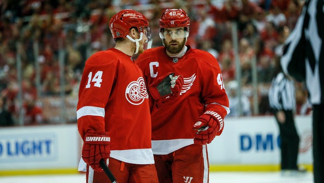 Red Wings forwards Gustav Nyquist and Henrik Zetterberg talk before a power play during the third period of the Wings' 2-0 win in Game 3 of the Eastern Conference quarterfinals Sunday in Joe Louis Arena.
