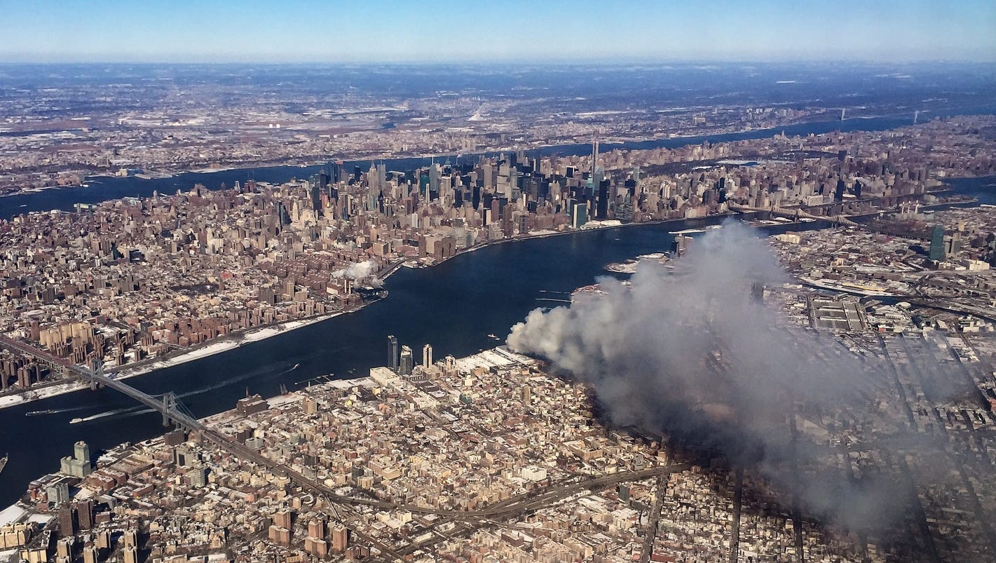 Large Brooklyn fire carries smoke across New York City