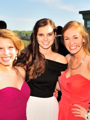 From left, seniors Blair Toedte and Ann-Elise Wall, along with junior Addalee Cantrell, celebrated at Cherokee Country Club before West High School prom.