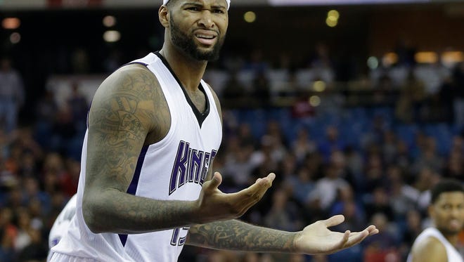 Sacramento Kings center DeMarcus Cousins questions a foul call during the second half of an NBA basketball game against the Denver Nuggets in Sacramento, Calif., Friday, Jan. 9,  2015.  The Nuggets won 118-108.(AP Photo/Rich Pedroncelli)