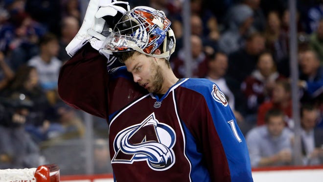 Avalanche goalie Semyon Varlamov reacts during a 5-2 loss to the Canucks.