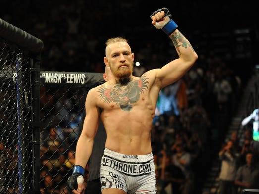 McGregor celebrates his first-round knockout of Dustin