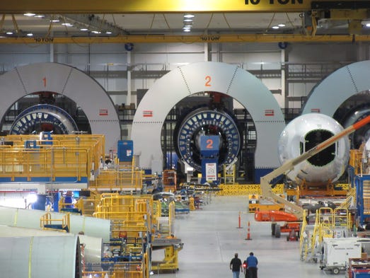 Portions of Boeing Dreamliner fuselages go through