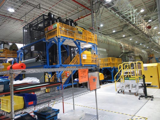 Boeing Dreamliner fuselages are worked on at the company's