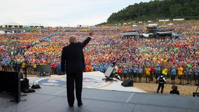 In this Monday, July 24, 2017 file photo, President Donald Trump waves to the crowd after speaking at the 2017 National Scout Jamboree in Glen Jean, W.Va. On Thursday, July 27, 2017, Chief Scout Executive Michael Surbaugh released a statement apologizing to members of the scouting community who were offended by the aggressive political rhetoric in the president's speech three days earlier.