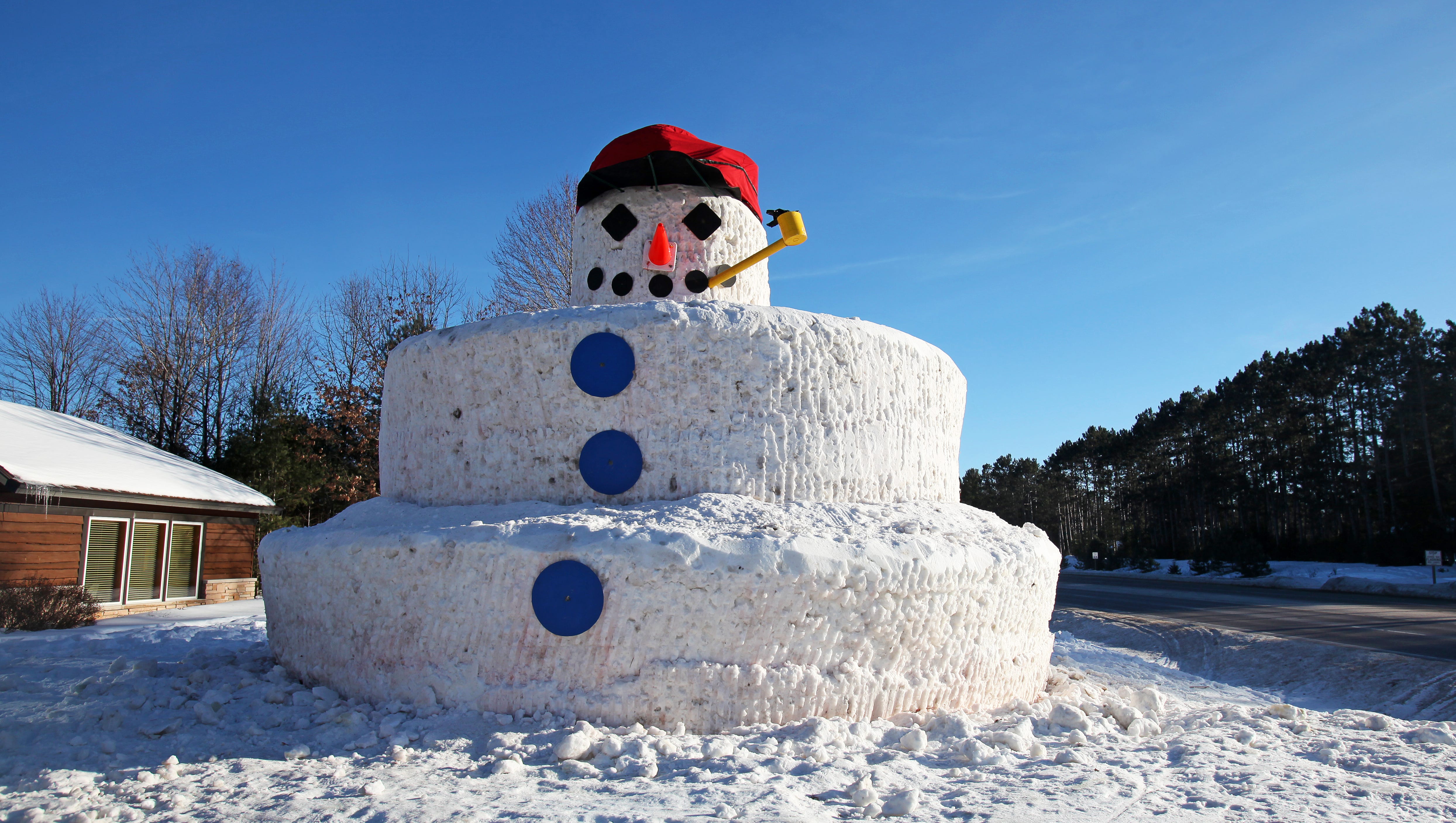Minocqua's 30-foot-tall Snowmy Kromer snowman welcomes visitors to