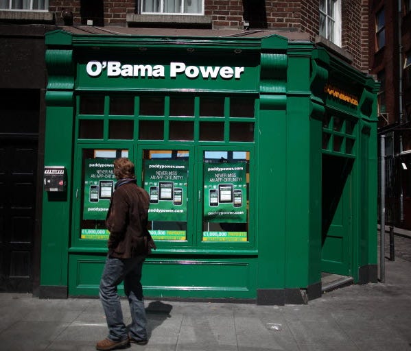 A Paddy Power bookmakers in Dublin undergoes a name change as former President Obama visits on May 23, 2001.
