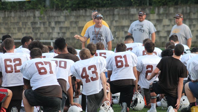 The Enquirer/Scott Springer
Roger Bacon coach Mike Blaut addresses his troops at Bron Bacevich Stadium.
Roger Bacon coach Mike Blaut addresses his troops at Bron Bacevich Stadium.
