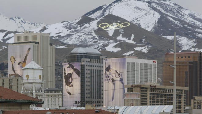 Downtown Salt Lake City in the early morning during the Salt Lake Winter Olympics on February 23, 2002. With venues still in place – some of them upgraded – from the 2002 Games, Salt Lake claims it can host again at a lower cost than other candidates, which aligns with the International Olympic Committee’s new blueprint for the Games.