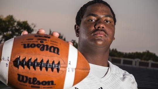 Warren Central offensive lineman Justin Britt committed to Iowa on Sunday.