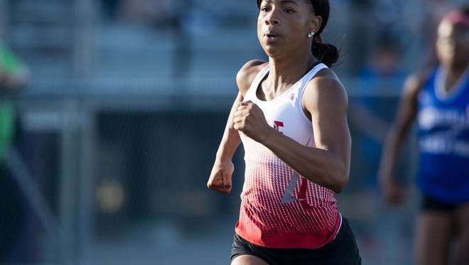 Tionne Brigham runs the 100 Meter Dash at the Mount Vernon girls' sectional track and field meet Tuesday, May 15. The Bulldogs' Tionne Brigham was the top individual with three first-place finishes. She won the 100 meters in 12.65, the 200 in 25.62 and the long jump with a leap of 18 feet, 7 inches.
