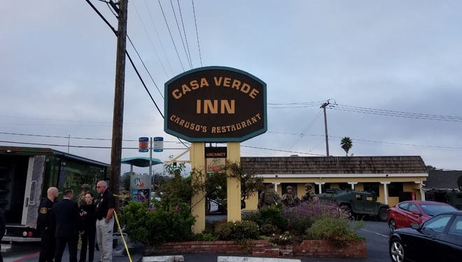 A man wanted in connection to a homicide was taken into custody after an hours-long standoff at Casa Verde Inn in Monterey on Saturday morning.