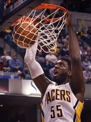 Indiana Pacer Roy Hibbert slams in the second of two first half dunks at Bankers Life Fieldhouse in Indianapolis as the Pacers held onto a 54-49 lead over the New York Knicks on Thursday, Jan. 29, 2015. The Knicks came into Indianapolis winning four out of their last five games. Hibbert had 8 points in the first half.