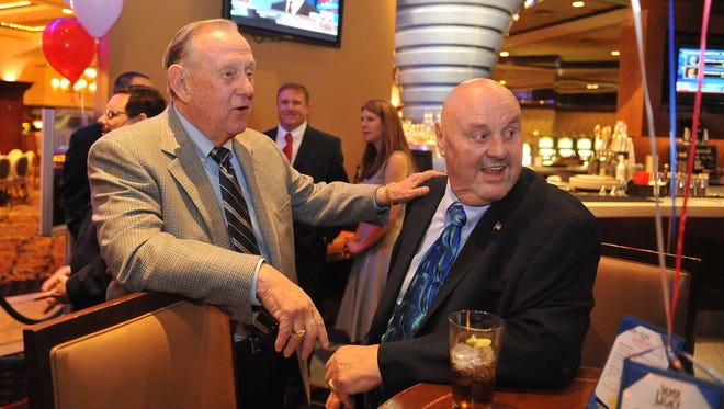 Reno Mayor Bob Cashell and Sparks Mayor Gino Martini talk together at a private party Tuesday at Aura inside the Silver Legacy.