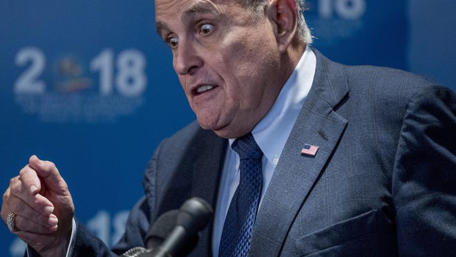 Rudy Giuliani, an attorney for President Donald Trump, speaks to reporters after speaking at the Iran Freedom Convention for Human Rights and democracy at the Grand Hyatt, Saturday, May 5, 2018, in Washington. (AP Photo/Andrew Harnik)