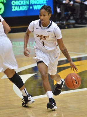 Southern Miss' Tajanay Veiga drives the lane Saturday during the Lady Eagles' game against West Alabama.