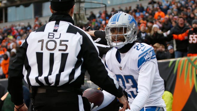Detroit Lions cornerback Darius Slay (23) looks to back judge Dino Paganelli (105) after his interception in the end zone was called back due to a penalty during the first half of an NFL football game against the Cincinnati Bengals, Sunday, Dec. 24, 2017, in Cincinnati.