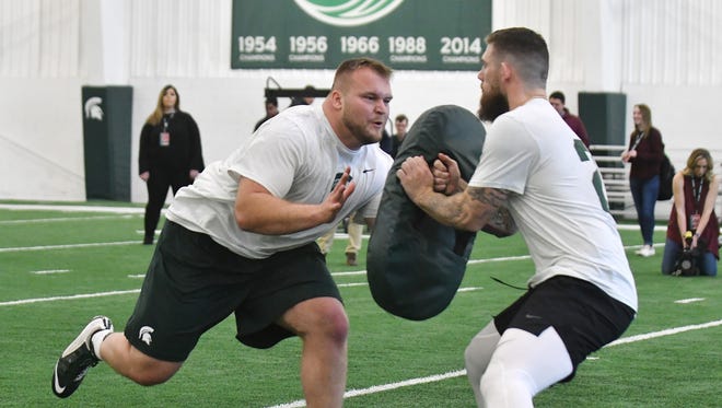 Michigan State offensive lineman Brian Allen, left, and linebacker Chris Frey are part of a small senior class that has a chance to get their name called in the NFL Draft.