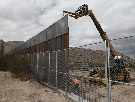 Image result for america builds mexico wall higher