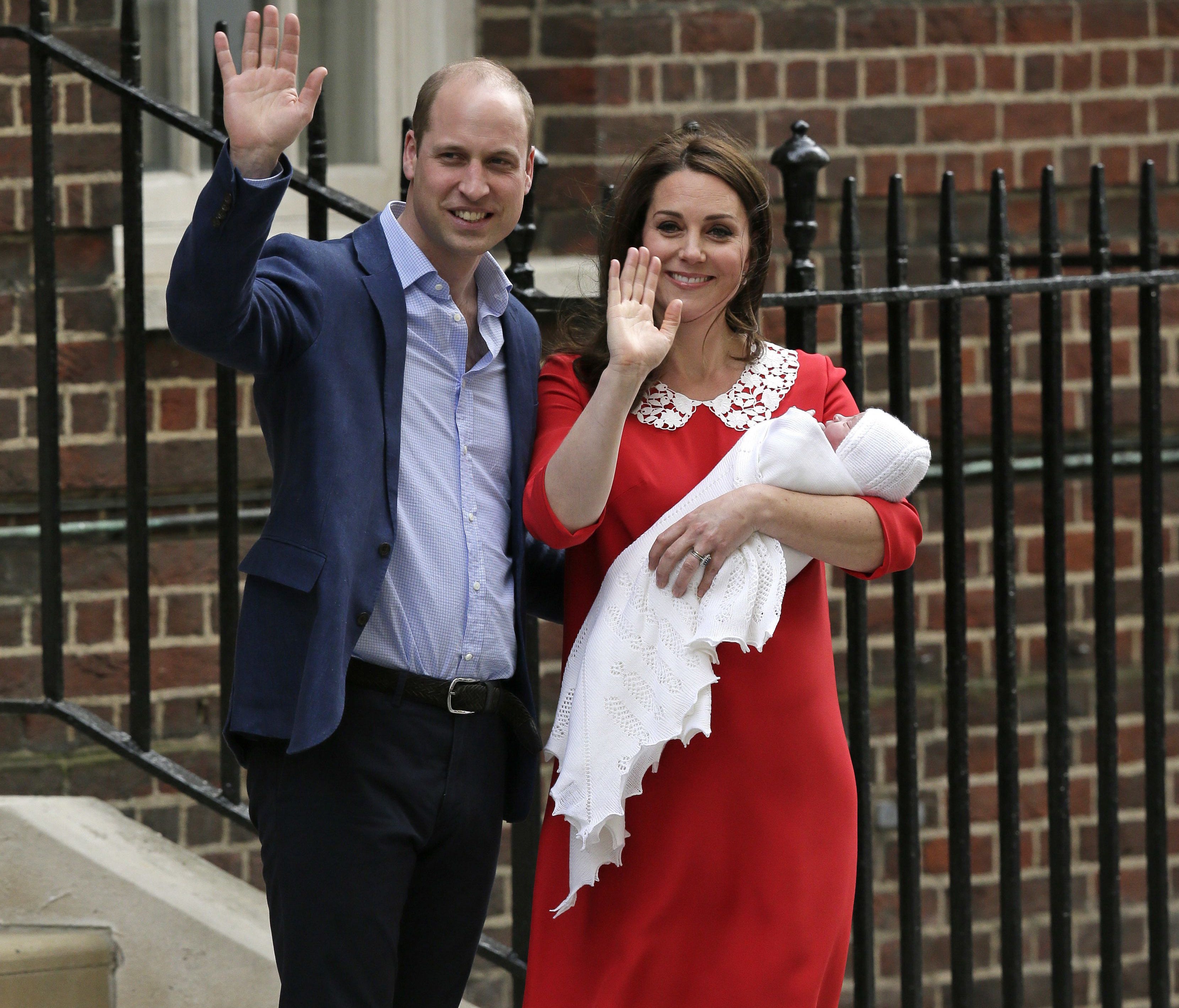 Prince William and Duchess Kate of Cambridge wave as leave hospital with their newborn son in London April 23, 2018.