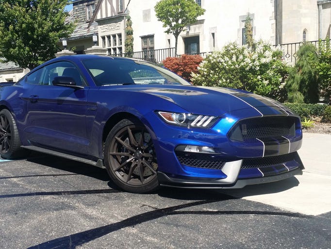 The Shelby's front splitters are jet black, yet still