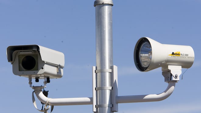 The Arizona House has passed a bill that would bar cities from using red light cameras and photo enforcement.