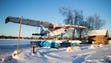Snow covers a Cessna seaplane on a very cold day at