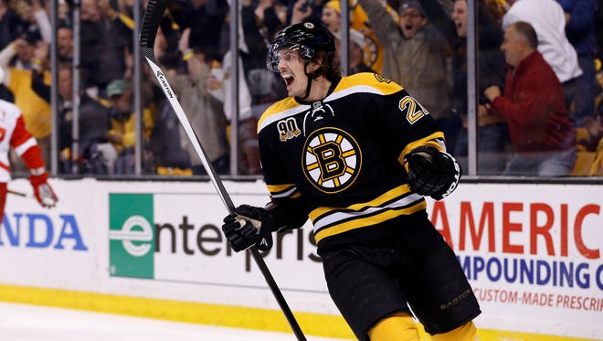 Boston Bruins right wing Loui Eriksson (21) celebrates after scoring a goal during the first period against the Detroit Red Wings in game five of the first round of the 2014 Stanley Cup Playoffs at TD Banknorth Garden.