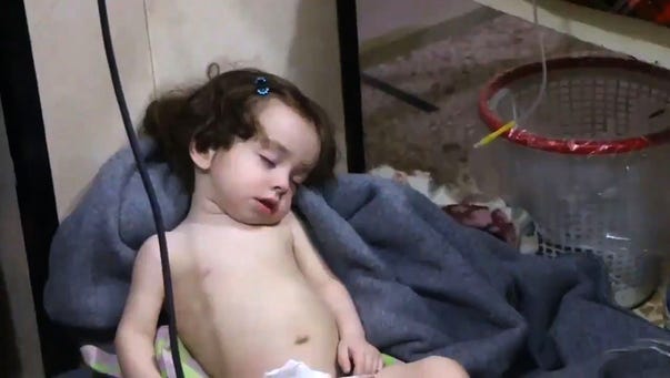 An image grab taken from a video released by the Syrian