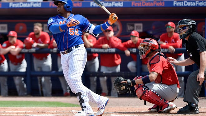 Yoenis Cespedes homers in the first inning Sunday.