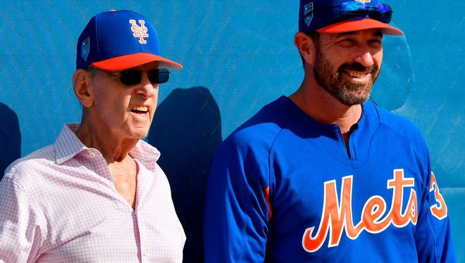 Feb 19, 2018; Port St. Lucie, FL, USA; New York Mets owner Fred Wilpon (left) talks with manager Mickey Callaway (right) during practice drills at First Data Field. Mandatory Credit: Steve Mitchell-USA TODAY Sports