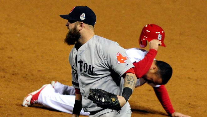 Kolten Wong slams his helmet after Mike Napoli tagged him out for a historic final out of Game 4.