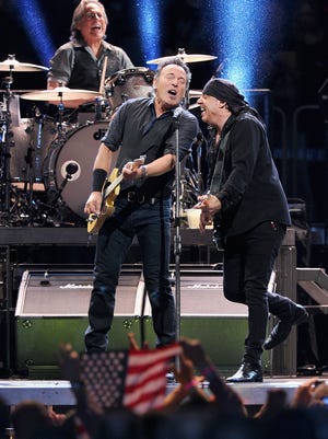Bruce Springsteen and the E Street Band perform at Madison Square Garden on April 6, 2012 in New York City. Pictured are Max Weinberg, Bruce Springsteen and Stevie Van Zandt. Credit: Jamie McCarthy/Getty Images.