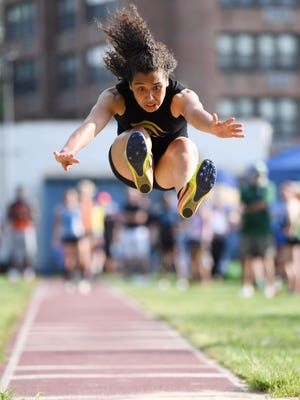 Bergen County Track Meet of Champions at Hackensack High School on Friday, May 19. 2017. Tiffany Bautista, of Paramus Catholic, competes in the triple jump.