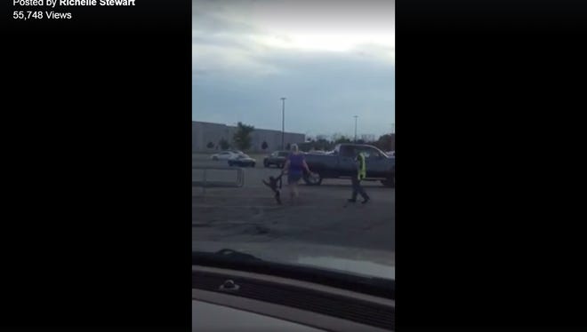 A woman took a video of the monkey she saw in a Walmart parking lot Sunday
