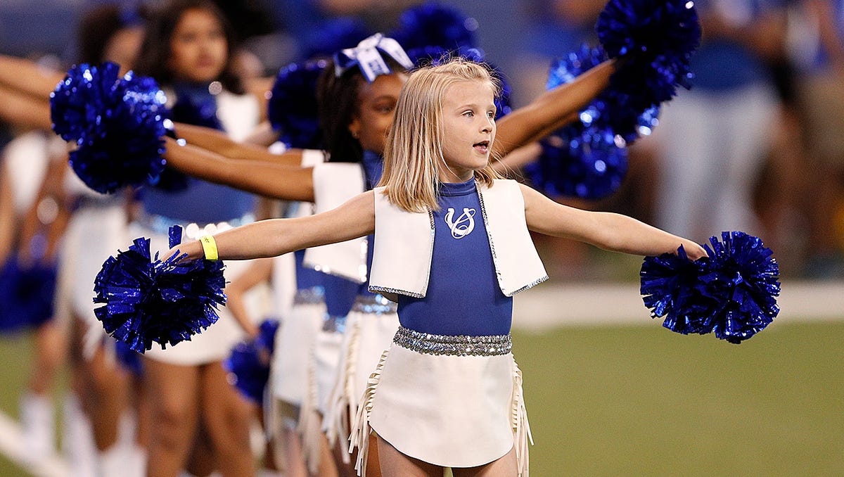 Indianapolis Colts junior cheerleaders shine in pregame performance.