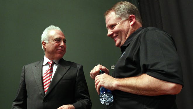 Eagles owner Jeffrey Lurie (left) stands with Chip Kelly after Kelly was introduced as Eagles coach Jan. 17, 2013.