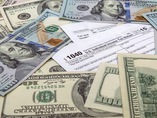 tax-1040-with-money_large.jpg