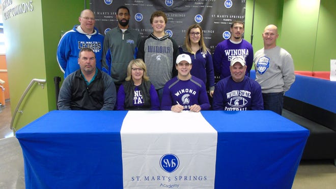 Clay Schueffner signed a letter of intent Wednesday to attend Winona State University to play football.