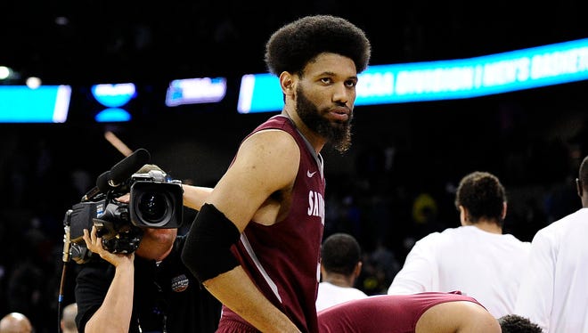 St. Joseph's Hawks forward DeAndre Bembry (43) reacts following the 69-64 loss against Oregon Ducks in the second round of the 2016 NCAA Tournament at Spokane Veterans Memorial Arena.