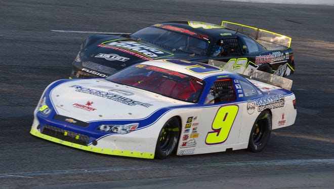 Chase Elliott makes his way around turn one Sunday during the 48th annual Snowball Derby at Five Flags Speedway.