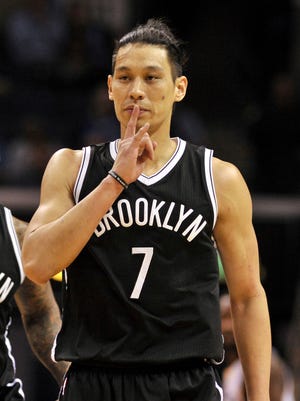 Brooklyn Nets guard Jeremy Lin (7) and guard Sean Kilpatrick (6) celebrate during the second half against the Memphis Grizzlies at FedExForum.
