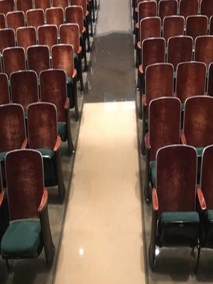 Water is seen in the Lafayette High auditorium after heavy rains in August 2016. Flooding in the auditorium has been a persistent problem for years. The exact cause has never been determined.