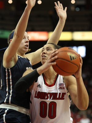 Louisville's Sara Hammond lead her team with eleven points. Feb. 8, 2015.